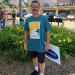 River Market 070826 man in RM teal tee
